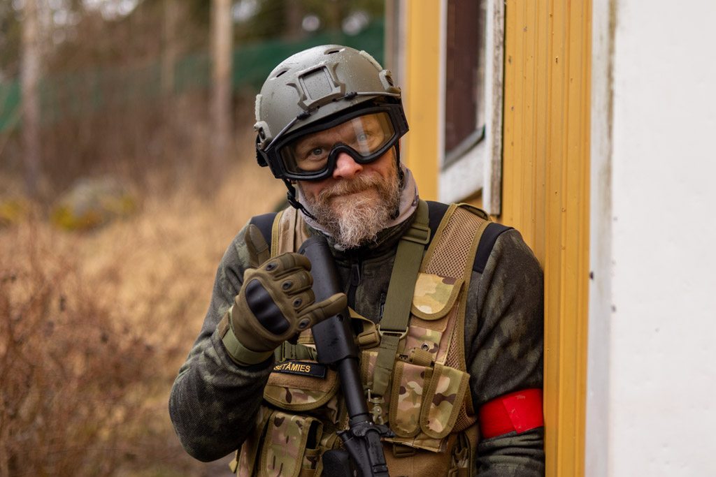 Pelaaja täydessä varustuksessa